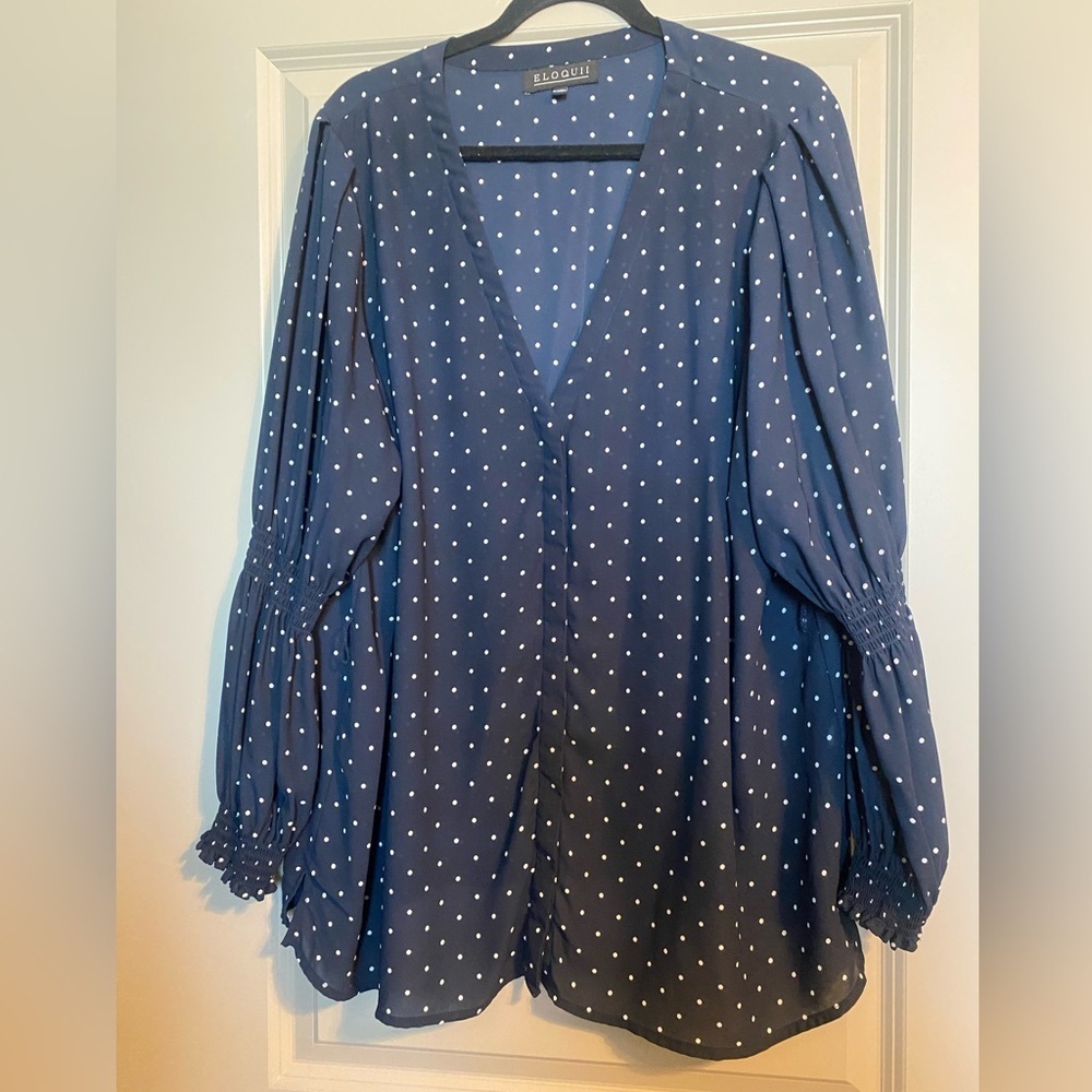 Navy polka dot long sleeve blouse.